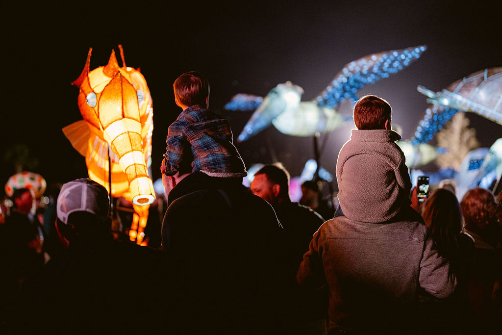 glowing seahorse and sea turtle lanterns at night during Hilton Head’s 2024 Lantern Parade